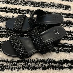 Black faux leather woven sandals heels